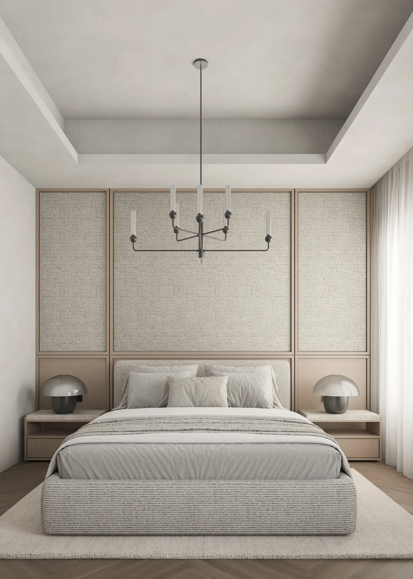 Bedroom with a full-height woven headboard, upholstered bed, paired nightstands and a black chandelier.
