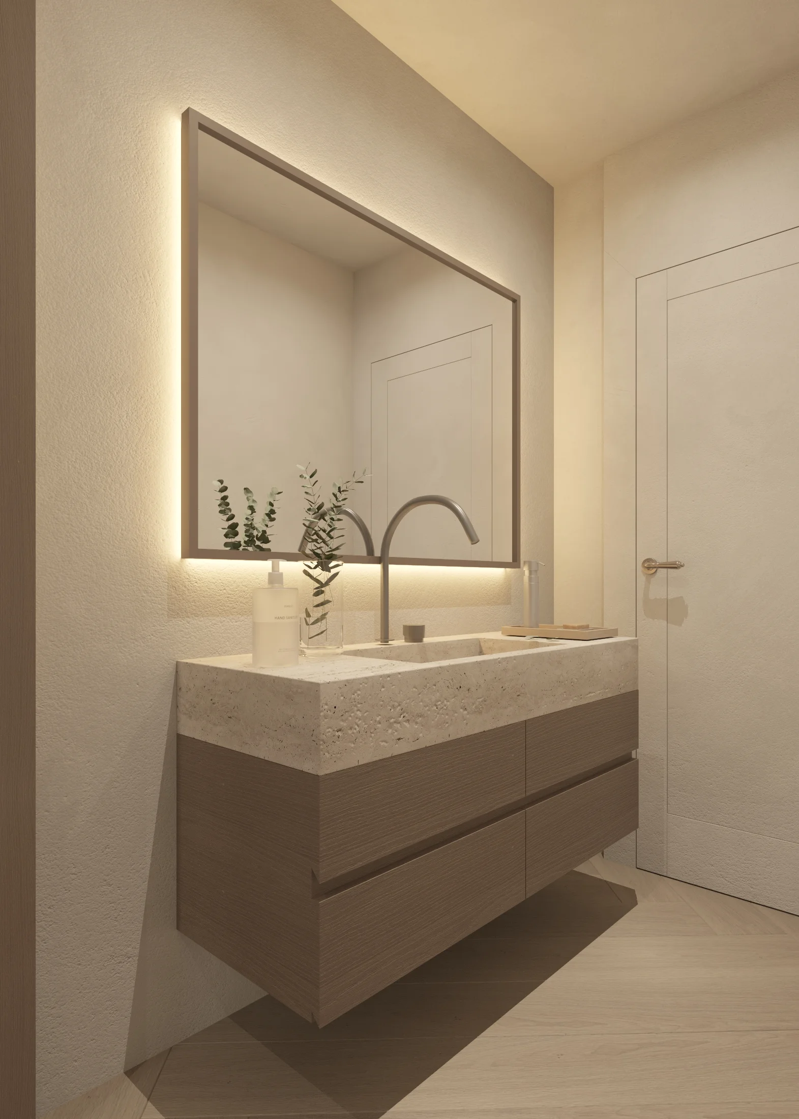 Angled view of the floating vanity, illuminated mirror and adjacent timber door.
