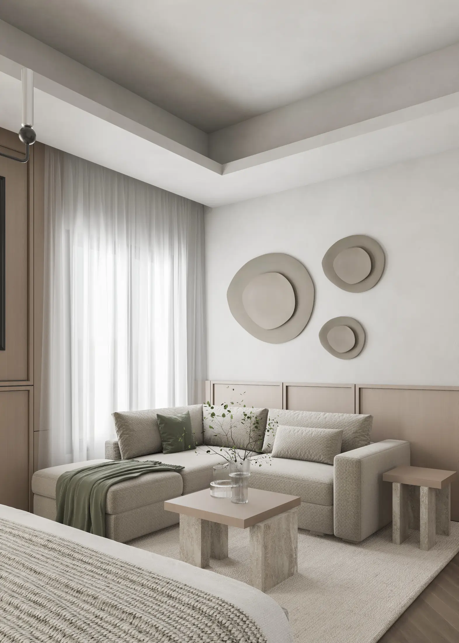 Bedroom lounge with a curved settee, paired stools and circular wall accents beside full-height curtains.