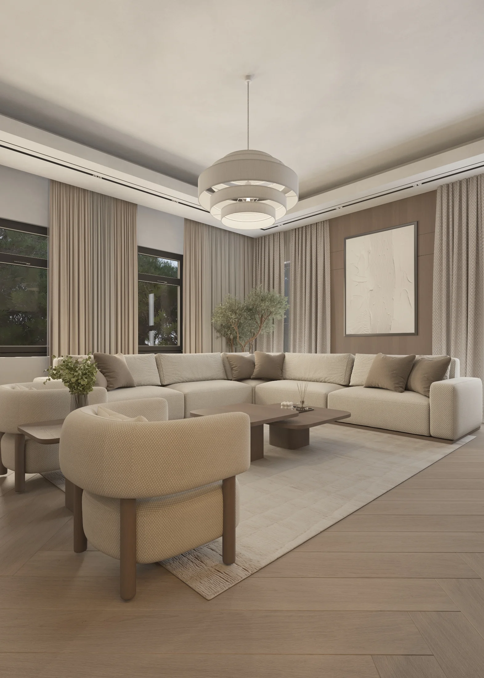 Al Yasmeen Villa salon with an L-shaped neutral sofa, rounded armchairs and a layered circular pendant.
