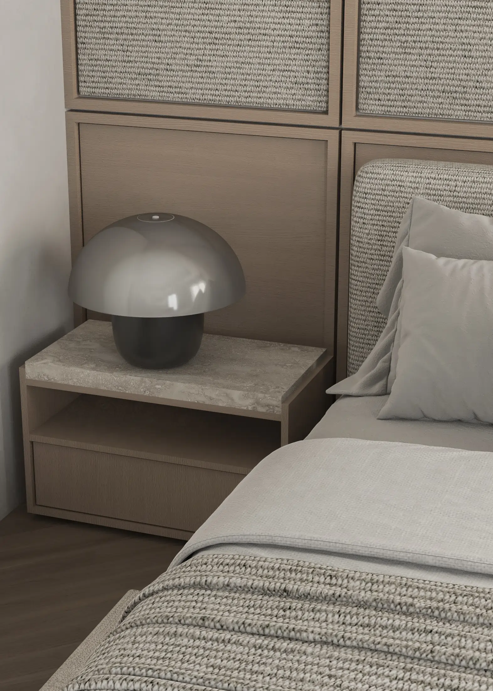 Dark domed bedside lamp on an integrated timber nightstand beside the textured headboard.