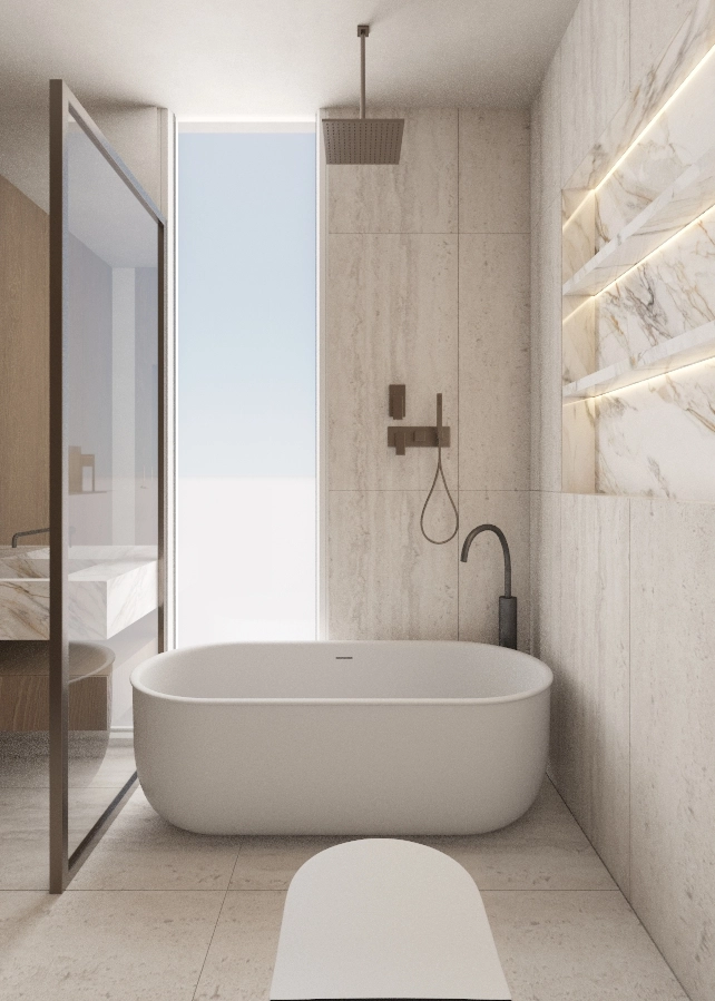 Freestanding bath framed by a tall window, rainfall shower and illuminated marble niches