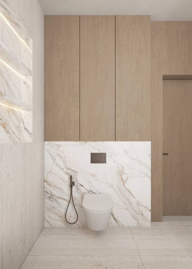 Wall-mounted toilet beneath pale timber cabinets and a marble splashback