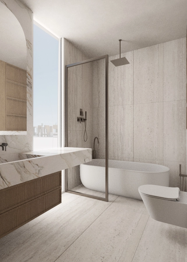 Marble washbasin counter facing a freestanding bath and tall window