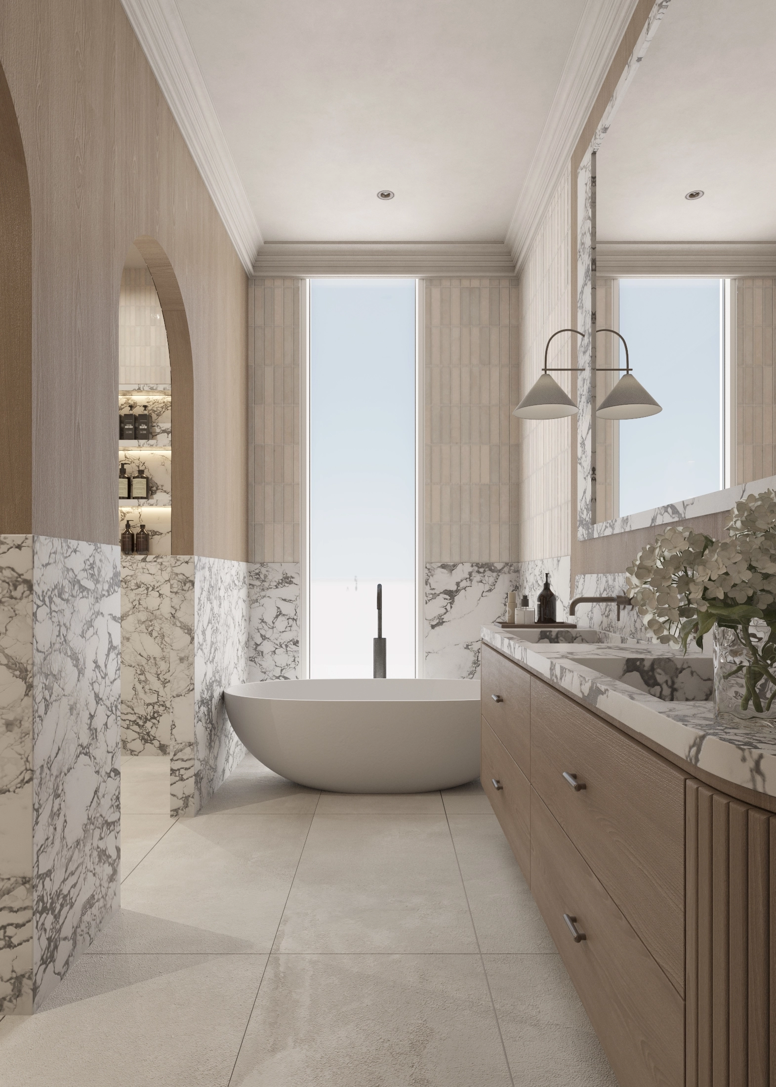 Master bathroom with freestanding bath, long timber vanity and marble-lined walls