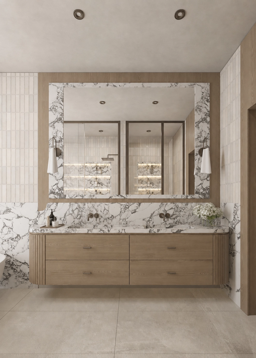Timber vanity beneath a large mirror reflecting the illuminated marble shelving