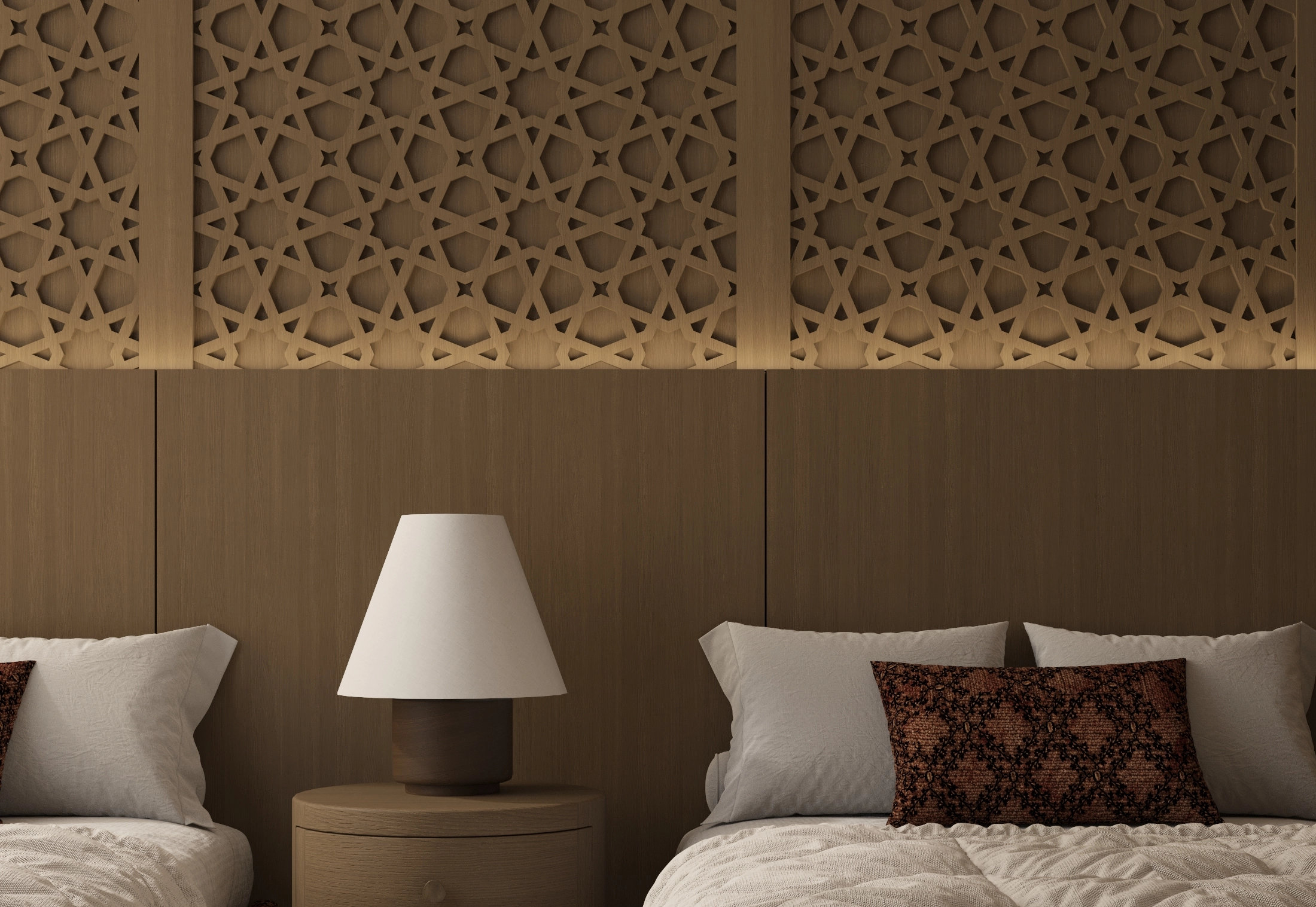 Close view of the twin bedroom lattice headboard, central table lamp and upholstered bed edges