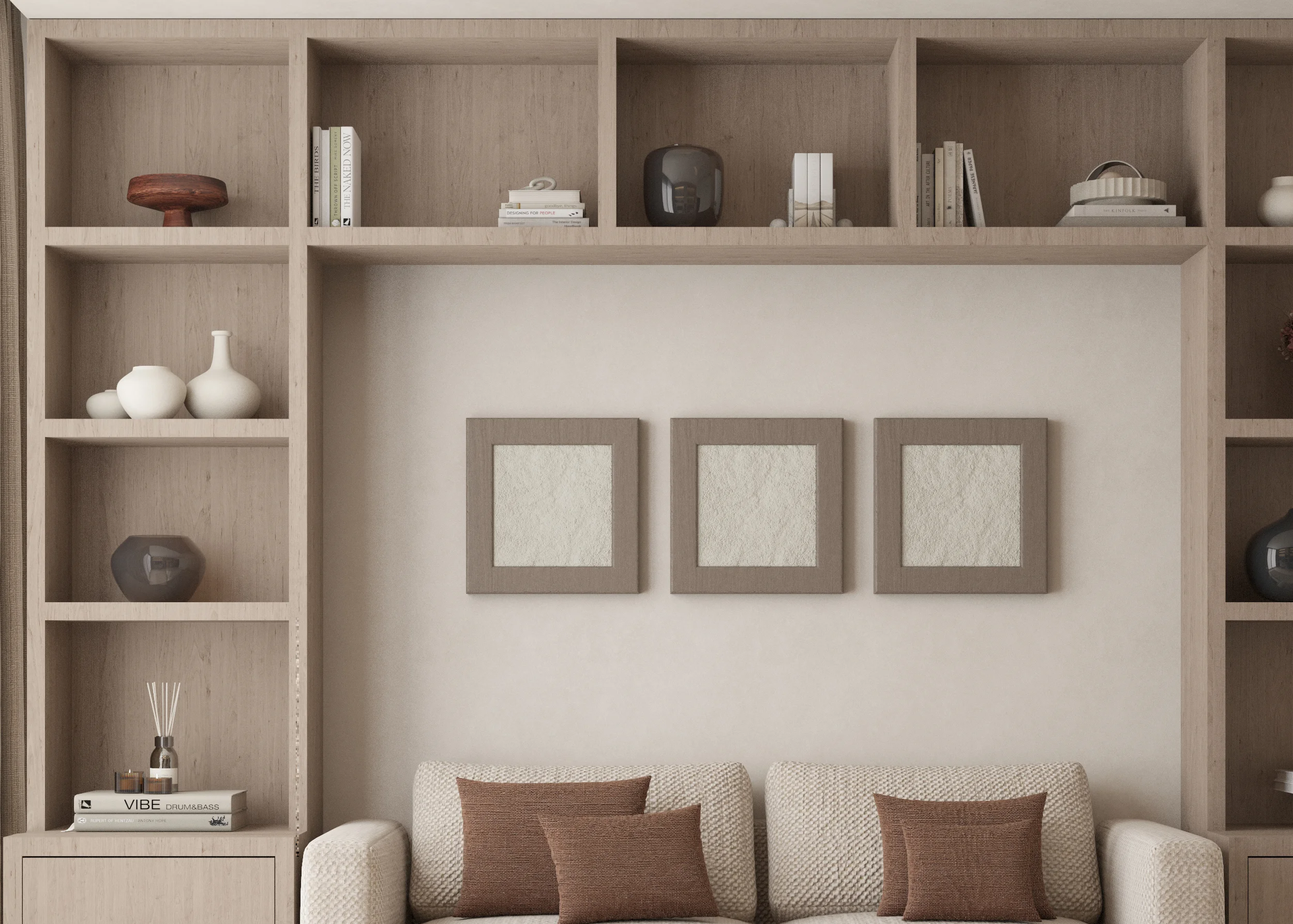 Close view of timber display niches and three textured artworks above the sofa