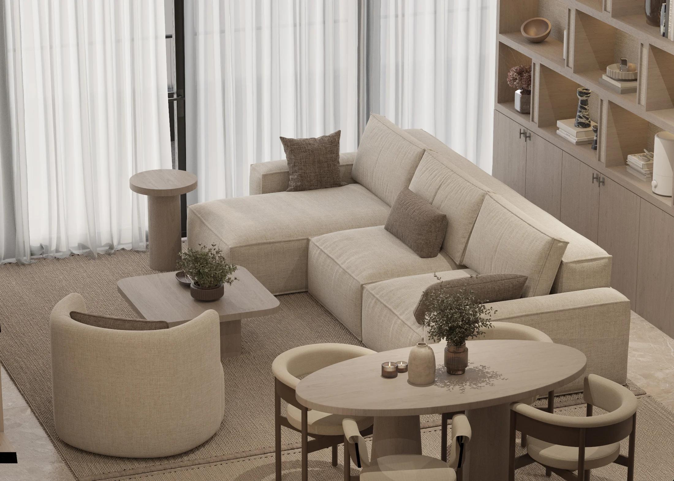Elevated view across the sectional sofa, curved lounge chair, coffee table and round dining setting