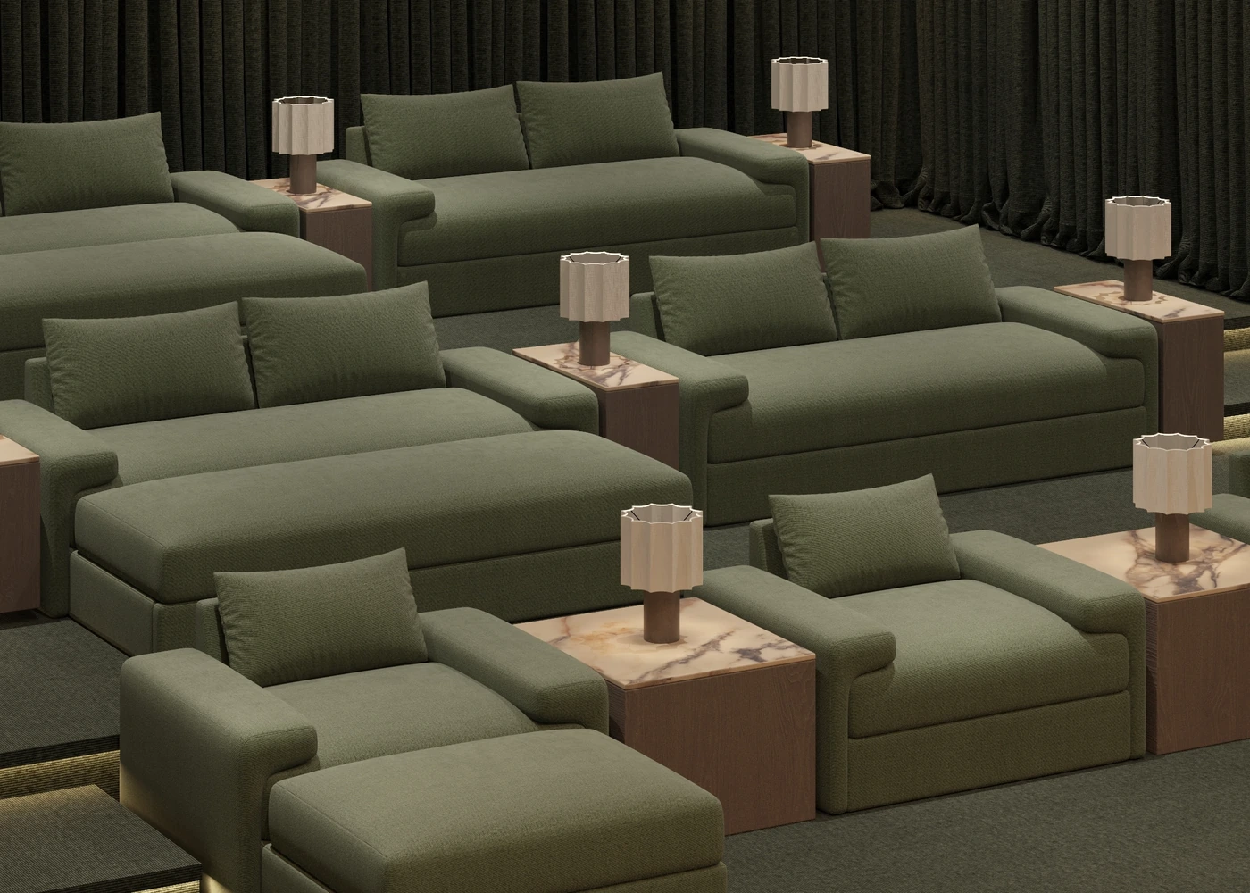 Tiered green cinema chaises with timber side tables and small lamps