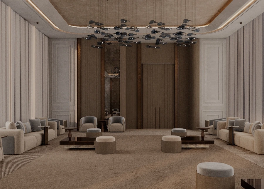 Wide majles view with rounded stools, pale armchairs and a sculptural ceiling
